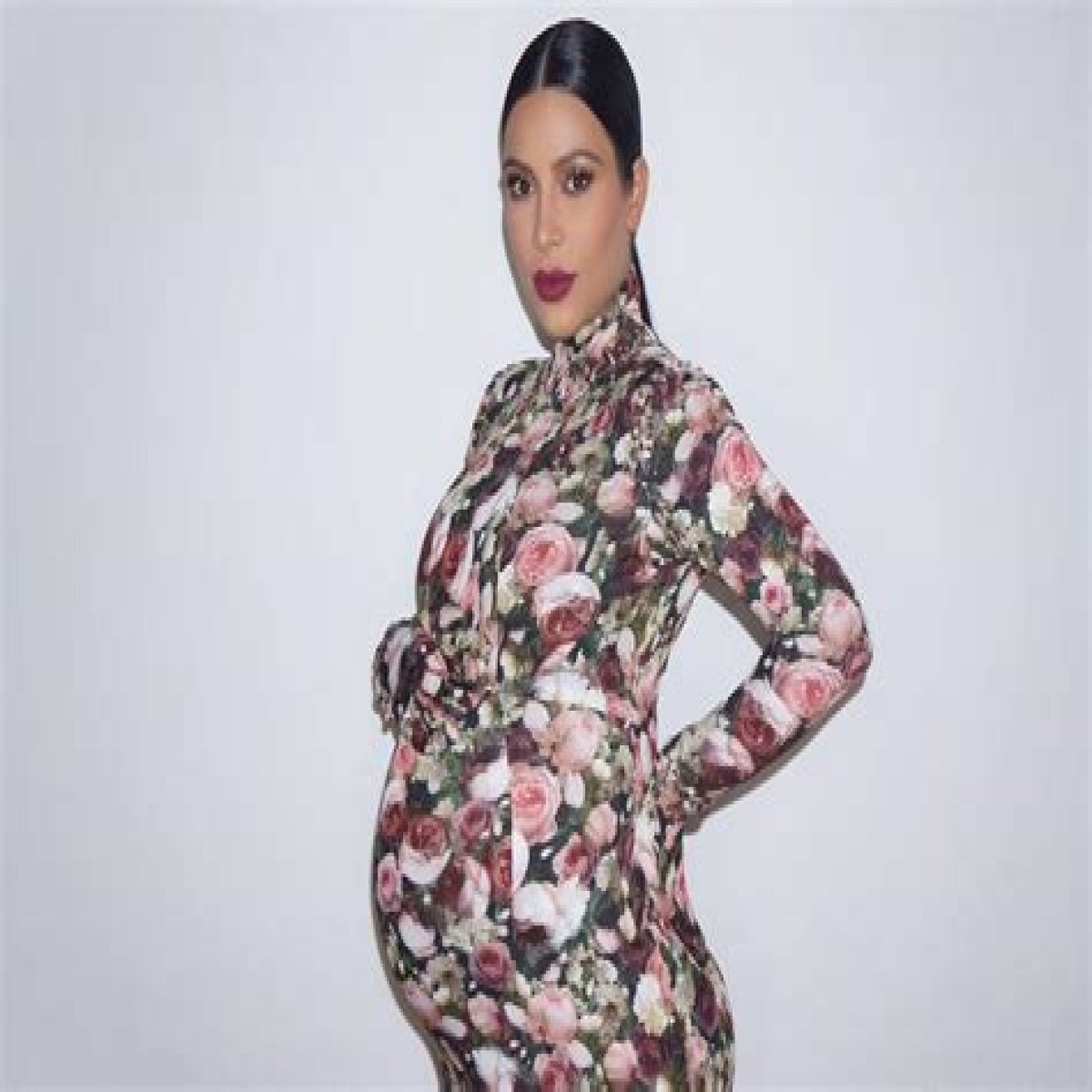 Kim Kardashian Dresses as Her Pregnant Met Gala Self for Halloween