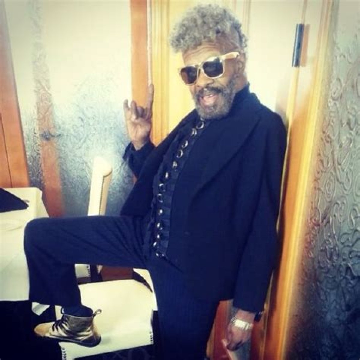 Sly Stone: dating, net worth, tattoos, smoking & body facts