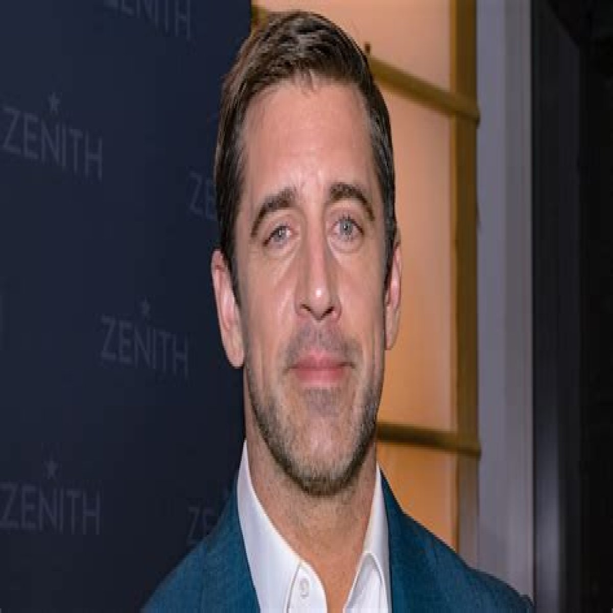 Why Aaron Rodgers And Joe Rogan's Friendship Is So Controversial